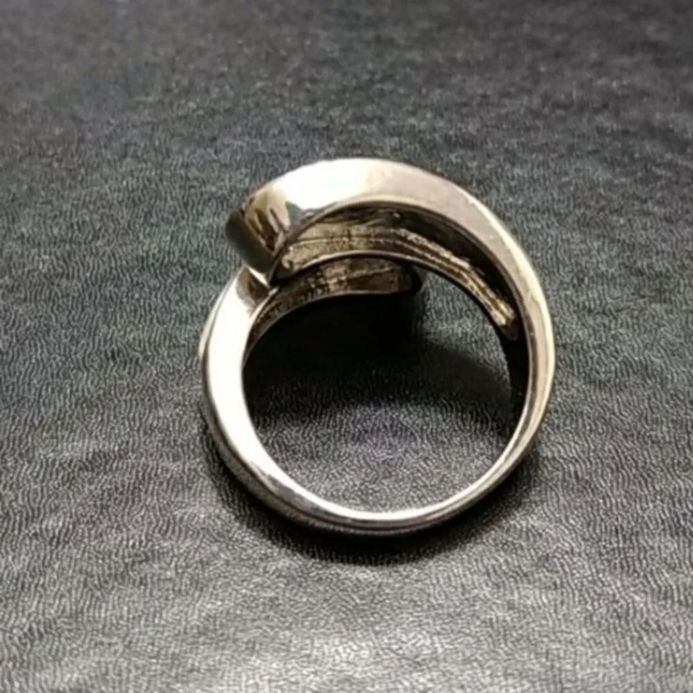 Silver tone ring with white stone Size 8